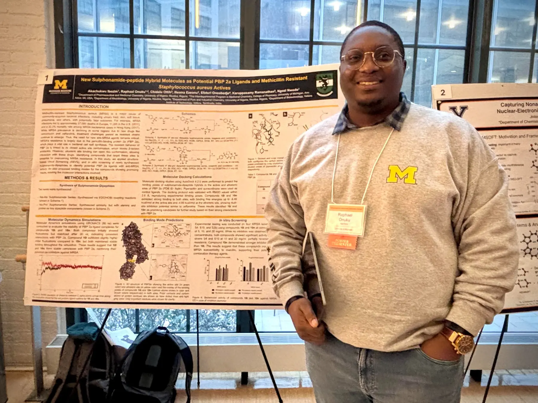 Raphael Onuku presenting medicinal chemistry research at a scientific poster session
