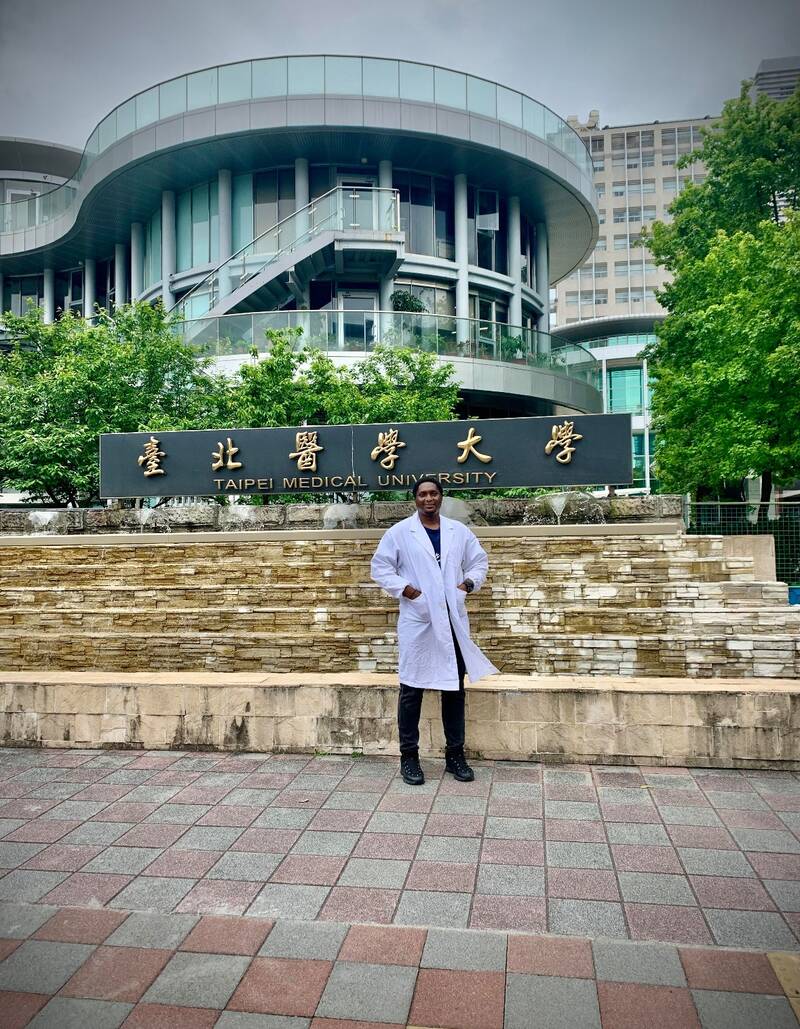 Raphael Onuku in a laboratory coat at Taipei Medical University